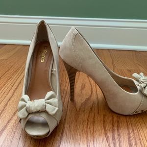 Tan suede peek a boo toe pump